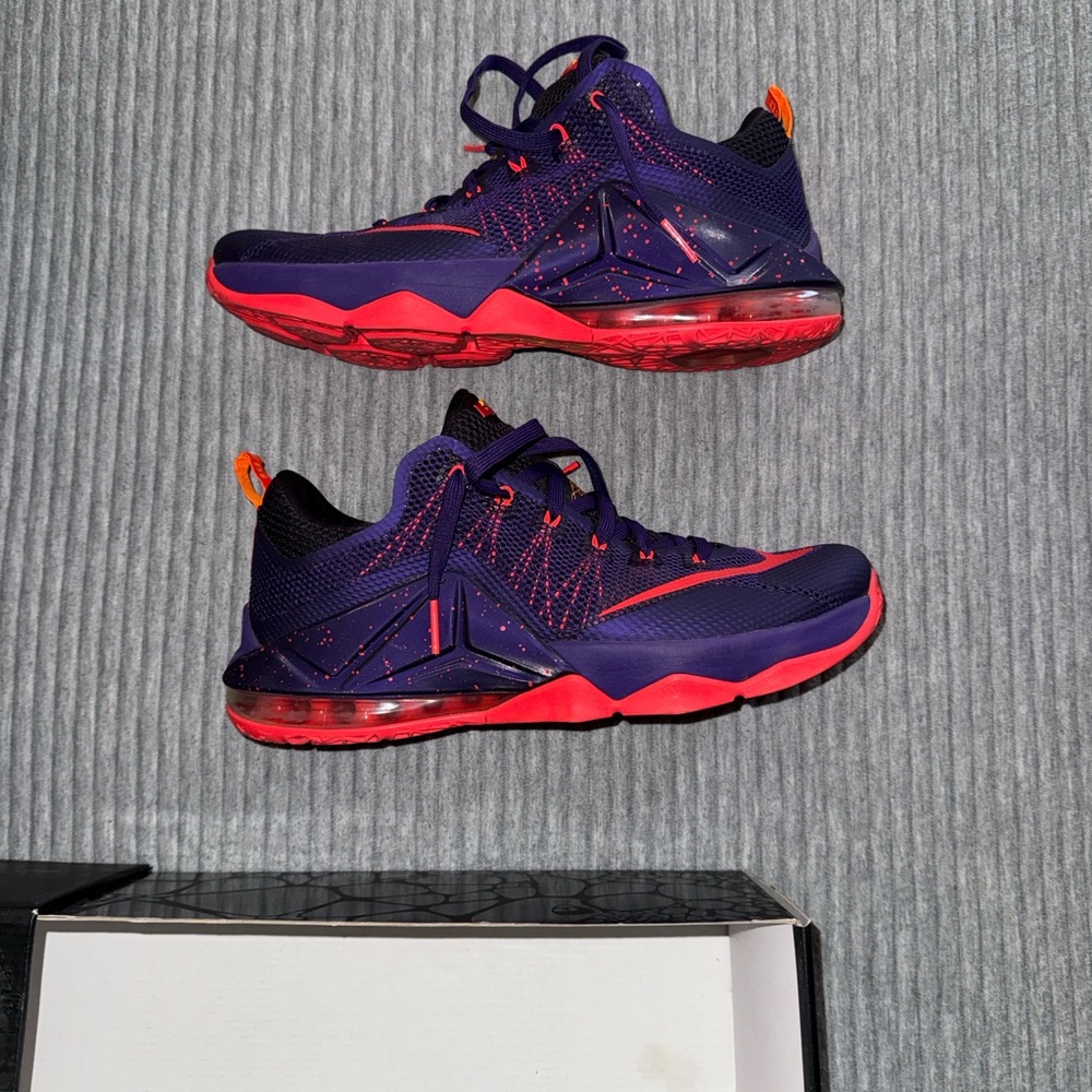 Nike LeBron 12 Low sneakers in a Court Purple colorway.